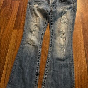 Distressed Blue Jeans